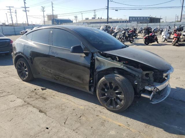 Photo 4 from auction – 2022 TESLA MODEL Y with VIN 7SAYGDEE8NF557969