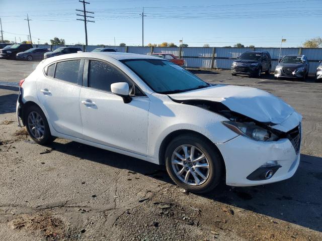 Photo 4 from auction – 2014 MAZDA 3 GRAND TO with VIN JM1BM1M70E1161735