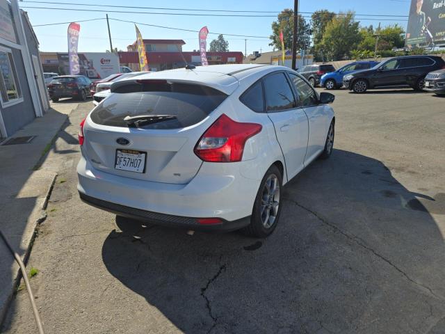 Photo 4 from auction – 2014 FORD FOCUS SE with VIN 1FADP3K27EL455761