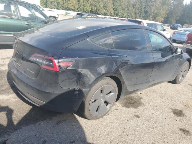 Photo 3 from auction – 2022 TESLA MODEL 3 with VIN 5YJ3E1EB5NF352059