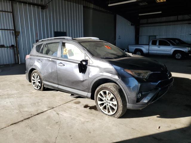 Photo 4 from auction – 2018 TOYOTA RAV4 with VIN JTMYFREV3JD115082