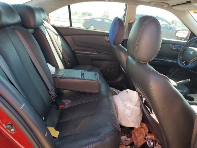 Photo 10 from auction – 2006 KIA OPTIMA LX with VIN KNAGE123265049867