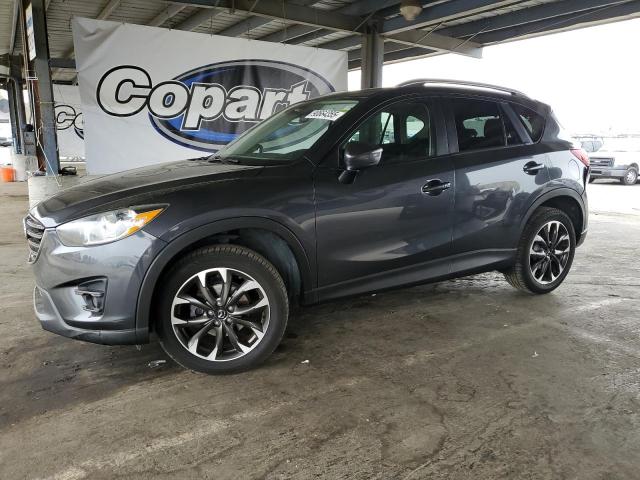 MAZDA CX-5 GT 2016 with VIN JM3KE2DY3G0651730 - Photo from auction