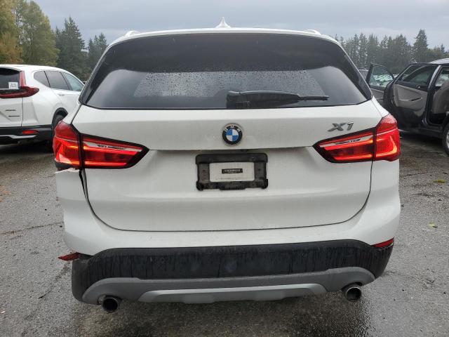 Photo 6 from auction – 2017 BMW X1 XDRIVE2 with VIN WBXHT3Z35H4A55028