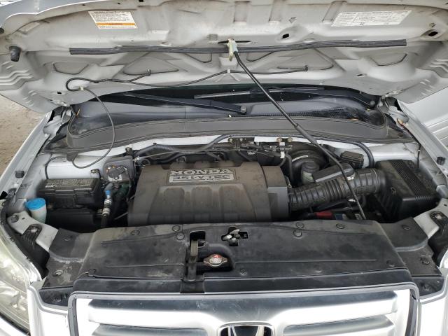 Photo 12 from auction – 2006 HONDA PILOT with VIN 5FNYF28506B006324