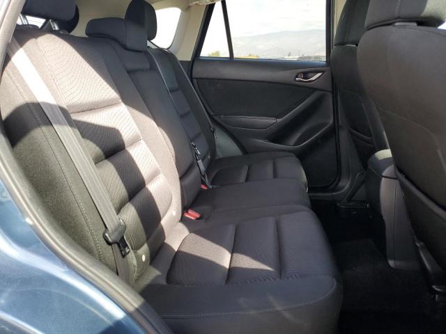 Photo 11 from auction – 2015 MAZDA CX5 with VIN JM3KE2CY9F0458420