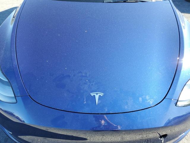 Photo 11 from auction – 2023 TESLA MODEL Y with VIN 7SAYGAEE2PF666848