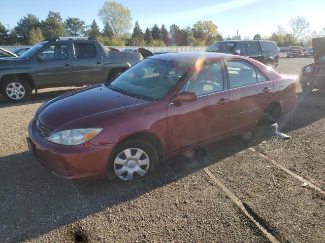 TOYOTA CAMRY LE 2002 with VIN JTDBE32K220128205 - Photo from auction