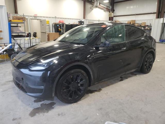 TESLA MODEL Y 2023 with VIN 7SAYGDEE1PA184032 - Photo from auction