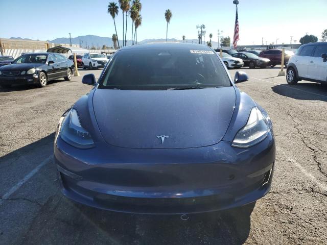 Photo 5 from auction – 2022 TESLA MODEL 3 with VIN 5YJ3E1EB0NF133803
