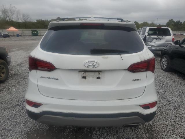 Photo 6 from auction – 2017 HYUNDAI SANTA FE S with VIN 5NMZU3LB4HH014599