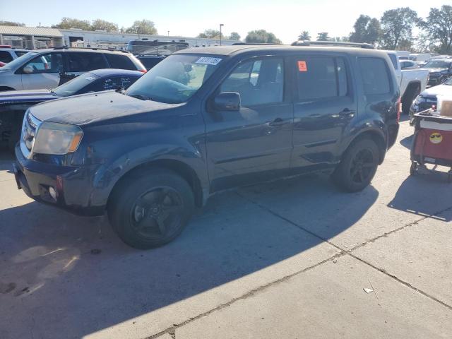 HONDA PILOT EXLN 2011 with VIN 5FNYF3H7XBB048873 - Photo from auction
