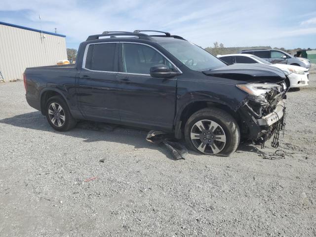Photo 4 from auction – 2017 HONDA RIDGELINE with VIN 5FPYK3F52HB037525