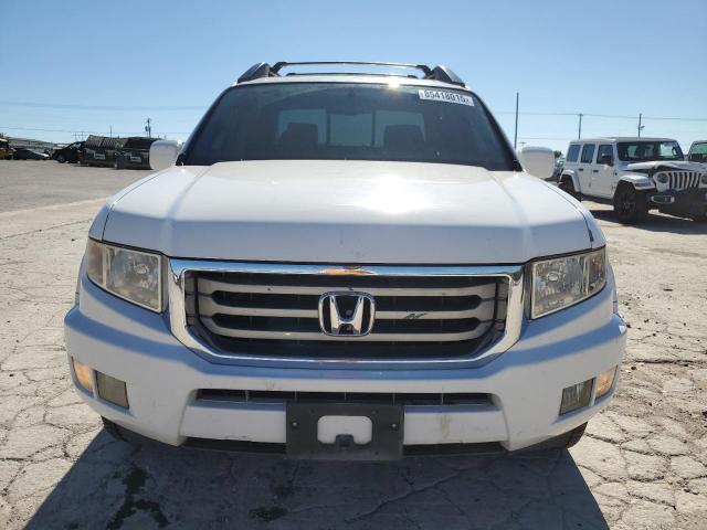 Photo 5 from auction – 2014 HONDA RIDGELINE with VIN 5FPYK1F53EB003402