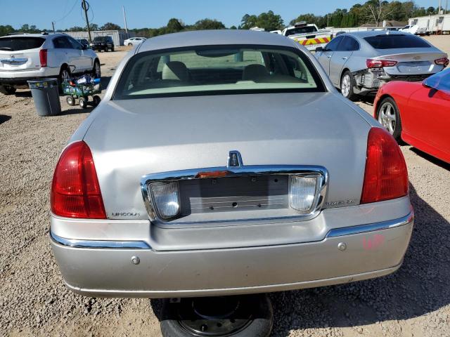 Photo 6 from auction – 2004 LINCOLN TOWN CAR E with VIN 1LNHM81W54Y632830