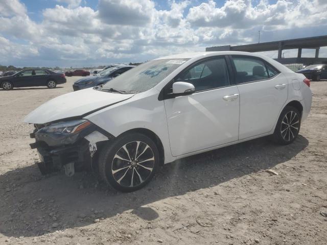 TOYOTA COROLLA L 2019 with VIN 5YFBURHE3KP949519 - Photo from auction
