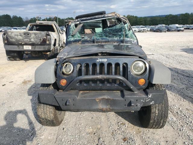 Photo 5 from auction – 2009 JEEP WRANGLER U with VIN 1J4GB39119L780313