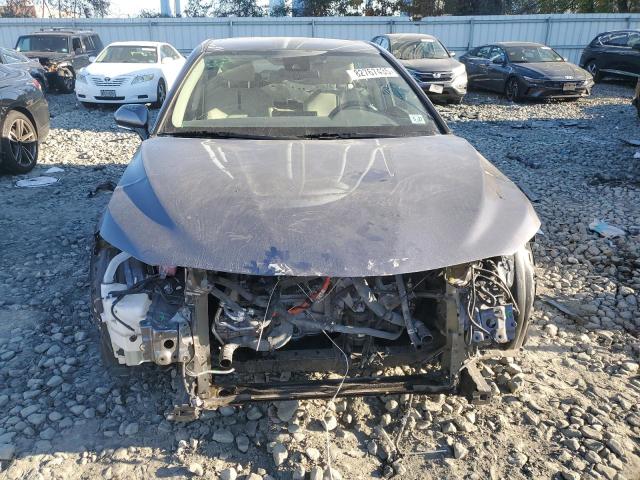 Photo 5 from auction – 2022 TOYOTA CAMRY with VIN 4T1C31AK8NU581219