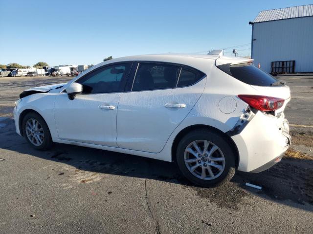 Photo 2 from auction – 2014 MAZDA 3 GRAND TO with VIN JM1BM1M70E1161735