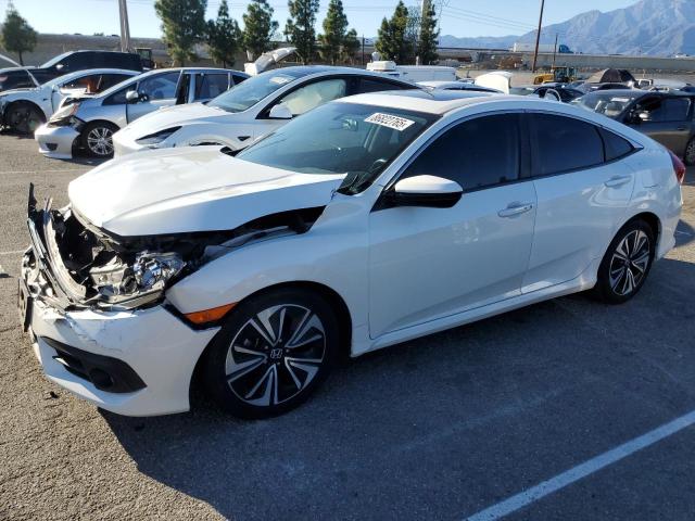 Photo 1 from auction – 2018 HONDA CIVIC EX with VIN JHMFC1F32JX033663