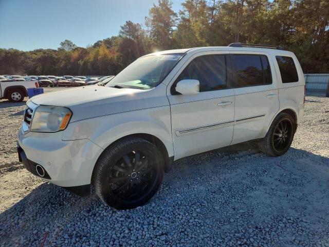 HONDA PILOT TOUR 2014 with VIN 5FNYF3H91EB011751 - Photo from auction