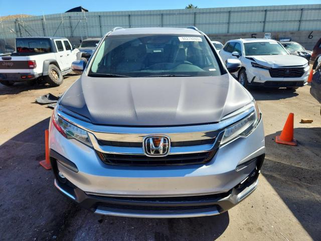 Photo 5 from auction – 2021 HONDA PILOT TOUR with VIN 5FNYF6H97MB076121