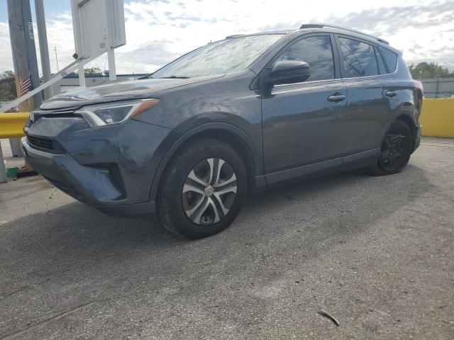Photo 1 from auction – 2018 TOYOTA RAV4 LE with VIN JTMZFREV2JJ196811