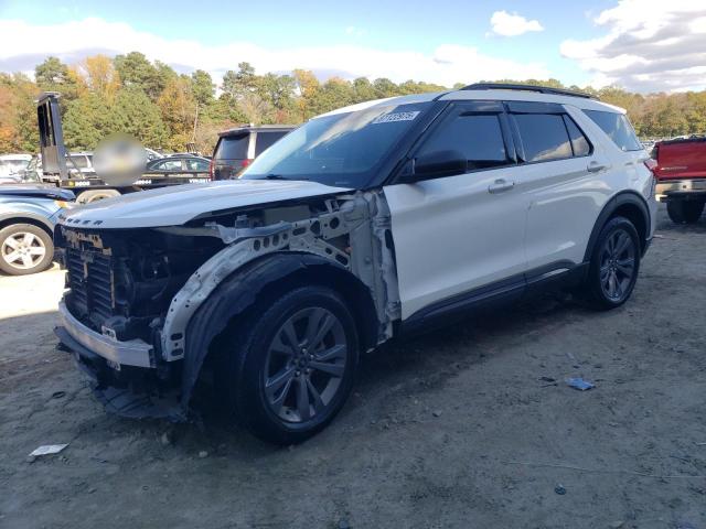 FORD EXPLORER 2021 with VIN 1FMSK8DH5MGB11072 - Photo from auction