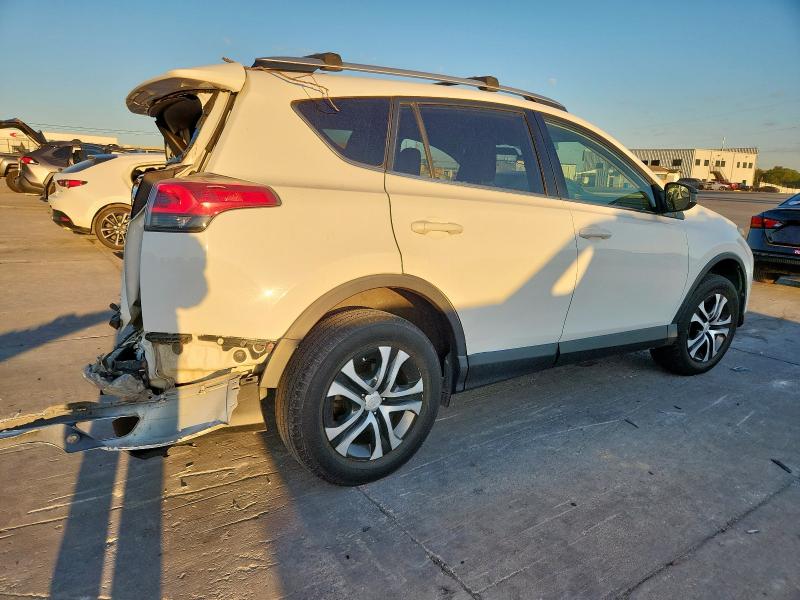 Photo 3 from auction – 2016 TOYOTA RAV4 LE with VIN JTMZFREV8GJ095362