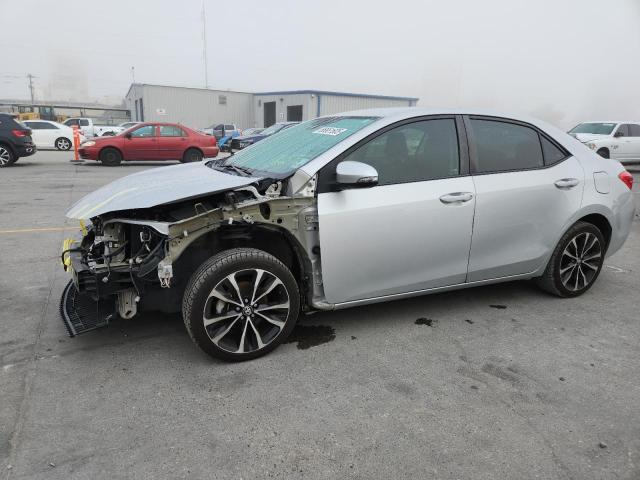 TOYOTA COROLLA L 2017 with VIN 5YFBURHE2HP585683 - Photo from auction