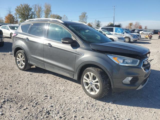 Photo 4 from auction – 2018 FORD ESCAPE TIT with VIN 1FMCU9J94JUA83666