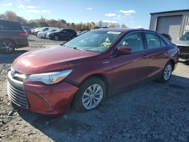 TOYOTA CAMRY HYBR 2016 with VIN 4T1BD1FK8GU178698 - Photo from auction