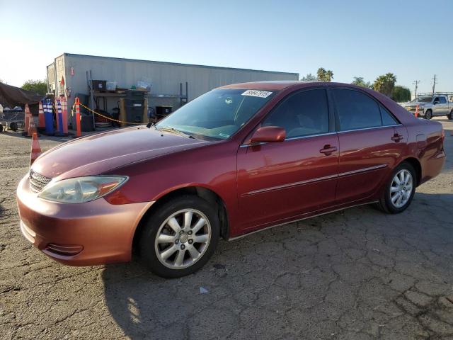 TOYOTA CAMRY LE 2002 with VIN JTDBE32KX20109403 - Photo from auction
