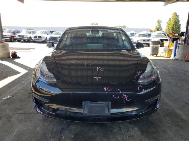 Photo 5 from auction – 2018 TESLA MODEL 3 with VIN 5YJ3E1EB7JF128902
