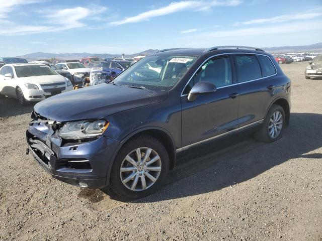 VOLKSWAGEN TOUAREG V6 2012 with VIN WVGFF9BP0CD000211 - Photo from auction