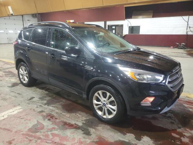 Photo 4 from auction – 2018 FORD ESCAPE SE with VIN 1FMCU9GD4JUD12424