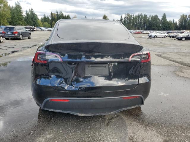 Photo 6 from auction – 2023 TESLA MODEL Y with VIN 7SAYGDEE3PF792640