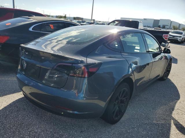 Photo 3 from auction – 2023 TESLA MODEL 3 with VIN 5YJ3E1EAXPF646504