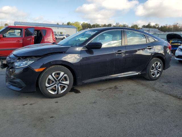 HONDA CIVIC LX 2018 with VIN 2HGFC2F54JH507322 - Photo from auction