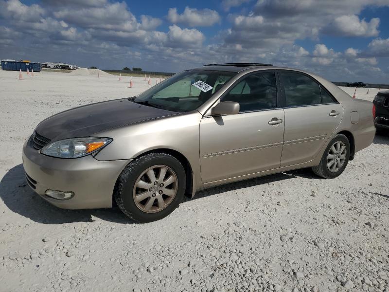 TOYOTA CAMRY LE 2003 with VIN 4T1BE32K93U694612 - Photo from auction