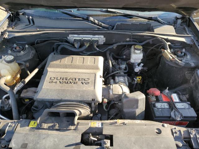 Photo 12 from auction – 2011 MERCURY MARINER PR with VIN 4M2CN9HG9BKJ01463
