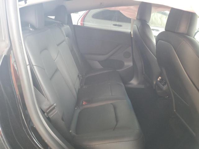 Photo 10 from auction – 2022 TESLA MODEL Y with VIN 7SAYGDEF0NF572118