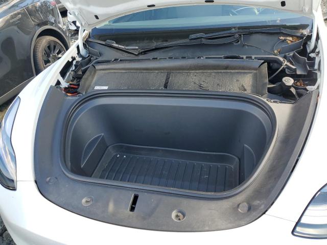 Photo 11 from auction – 2023 TESLA MODEL Y with VIN 7SAYGDEE5PF684178