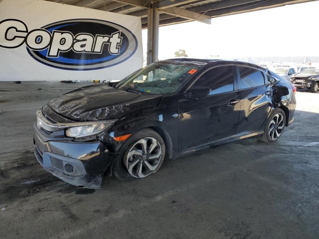 HONDA CIVIC EX 2017 with VIN 2HGFC2F8XHH537218 - Photo from auction