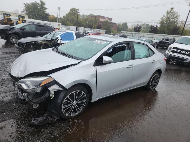 TOYOTA COROLLA L 2015 with VIN 2T1BURHE1FC303112 - Photo from auction