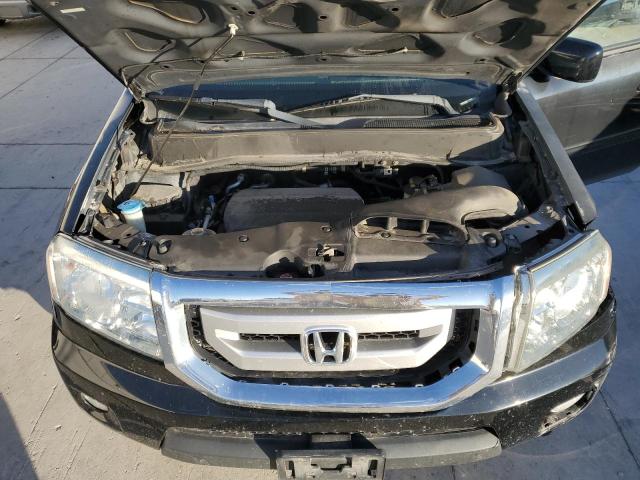 Photo 12 from auction – 2011 HONDA PILOT EX with VIN 5FNYF4H4XBB057911