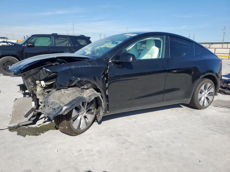 TESLA MODEL Y 2024 with VIN 7SAYGDEE2RA268590 - Photo from auction