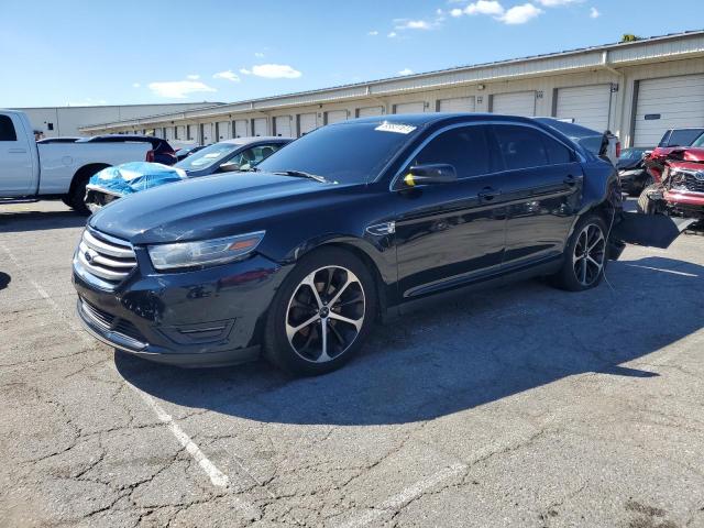 FORD TAURUS SEL 2014 with VIN 1FAHP2E86EG149963 - Photo from auction