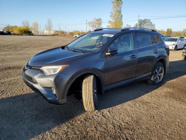 TOYOTA RAV4 LE 2018 with VIN 2T3BFREV2JW776899 - Photo from auction