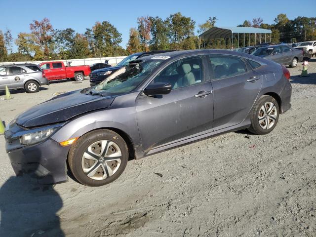 HONDA CIVIC LX 2018 with VIN 2HGFC2F67JH579365 - Photo from auction